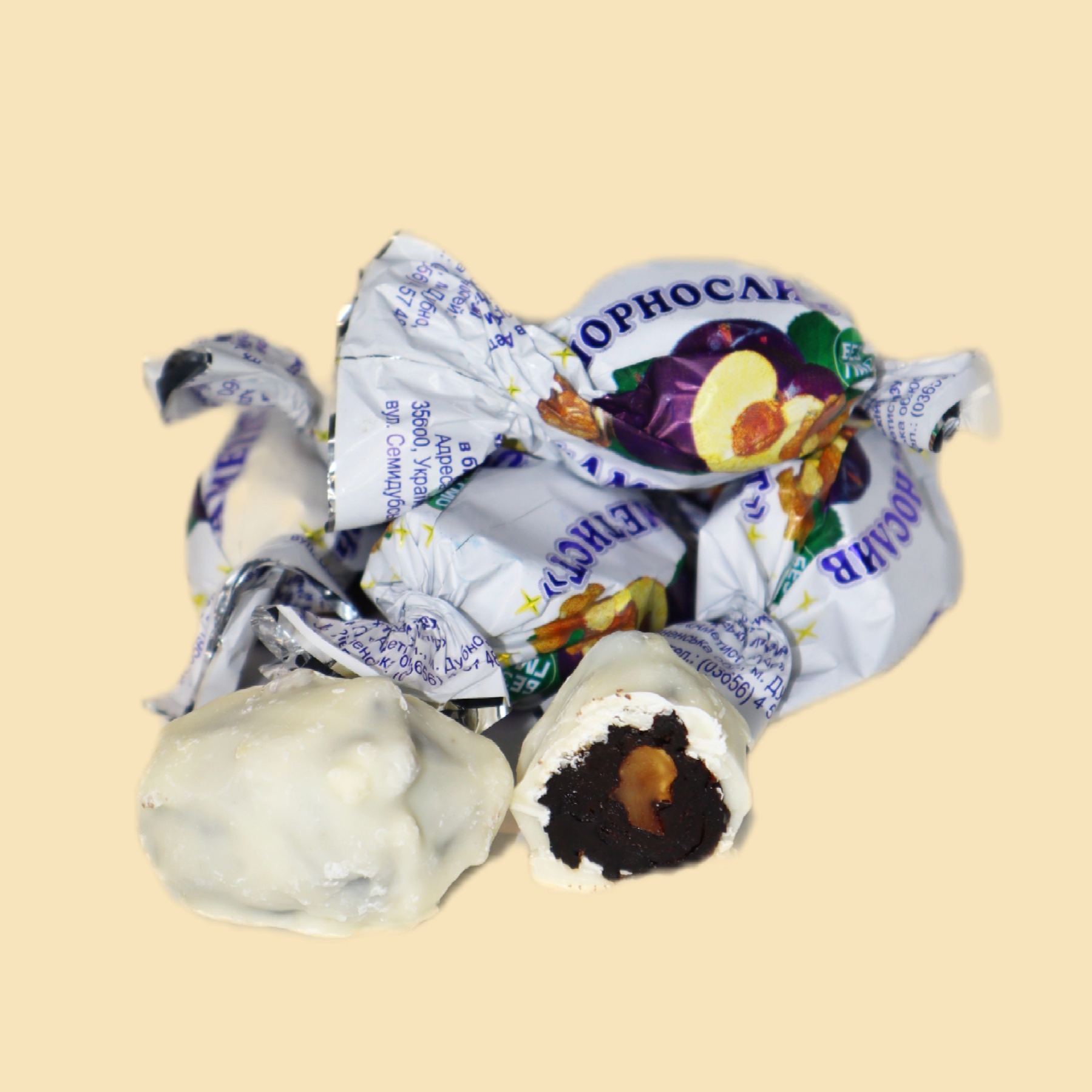 Prune în ciocolată albă